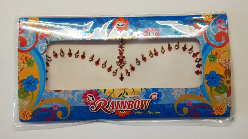 Червоні бінді (над бровами) 